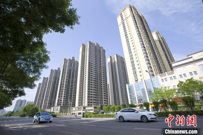 資料圖：車輛從一樓盤前經(jīng)過。 <a target='_blank' href='/'><p  align=